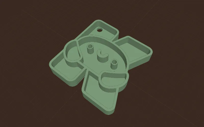 The Kutterly logo as a keychain, with its ring hole in the corner of the K.